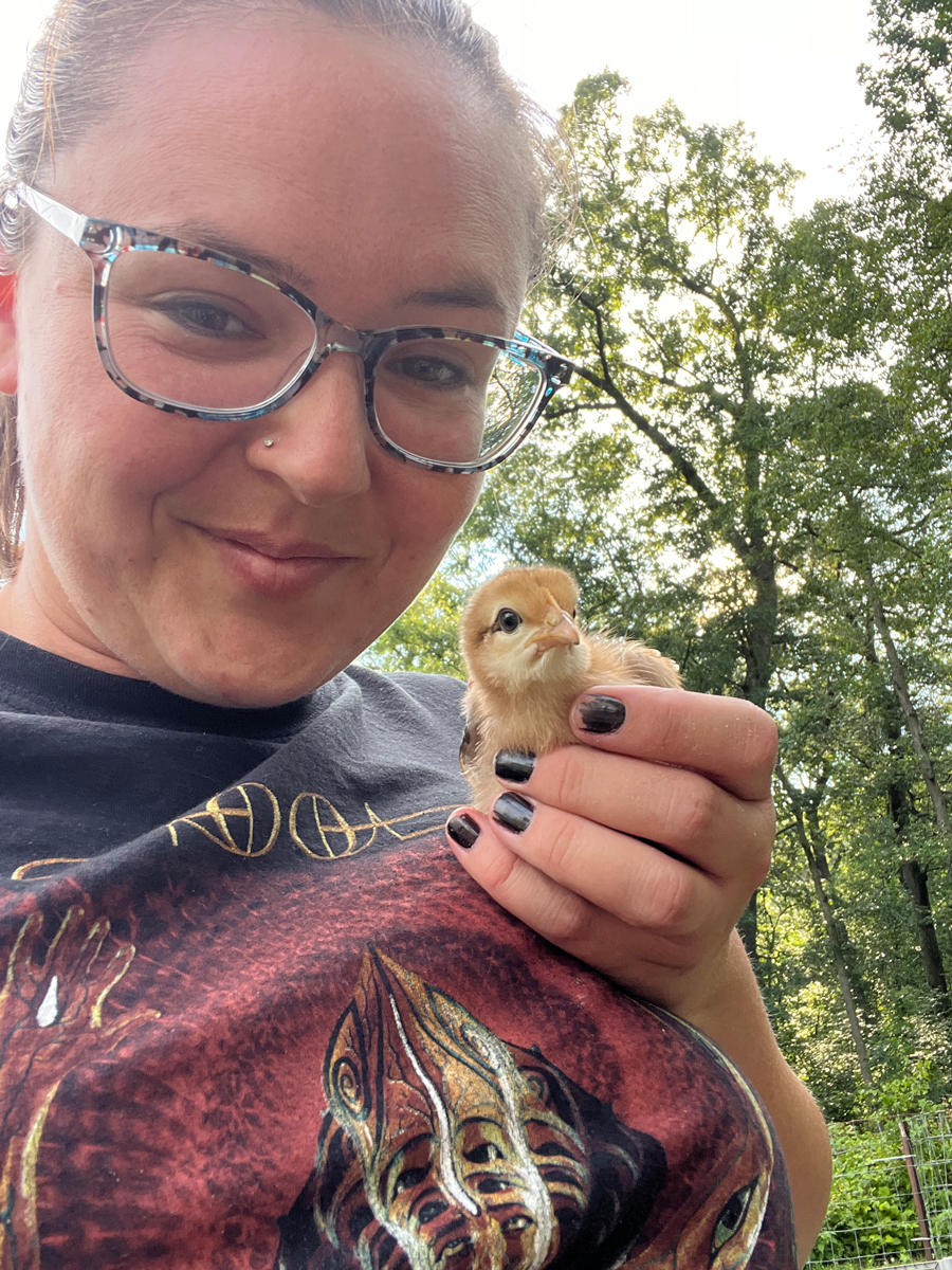 Myself holding a baby chick